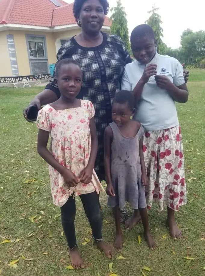 Vulnerable children smiling during community learning activities at Happy Children's Home